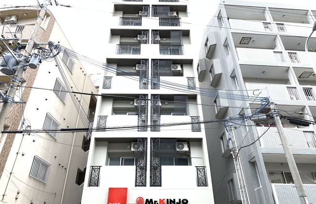 Mr.KINJO Miki24 in front of Makishi Station - Photo 1