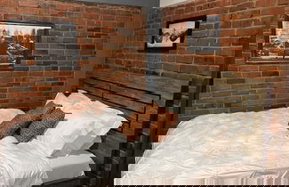 Foto 2 - Cozy Bricks Apartments