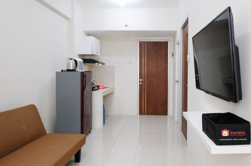 Foto 8 - Clean And Comfy 2Br Apartment At Puncak Kertajaya