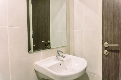 Photo 12 - Minimalist 2Br Apartment At Serpong Garden Near Train Station