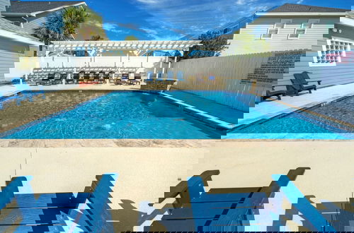 Photo 26 - Chic 2BR Coastal Condo Shared Pool Near the Beach Envy the Adventure