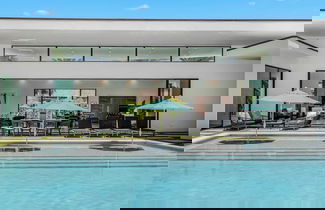 Photo 2 - Luxe Retreat w Pool & Putting Green Sleeps 17 Bravo Villa 1 by Avantstay