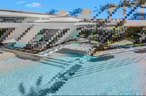 Photo 8 - Luxe Retreat w Pool & Putting Green Sleeps 17 Bravo Villa 1 by Avantstay