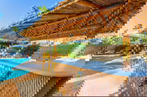 Photo 2 - Tiki Paradise w Htd Pool Putt Grn Tiki Bar