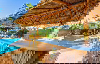 Photo 2 - Tiki Paradise w Htd Pool Putt Grn Tiki Bar