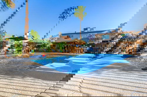 Photo 40 - Tiki Paradise w Htd Pool Putt Grn Tiki Bar