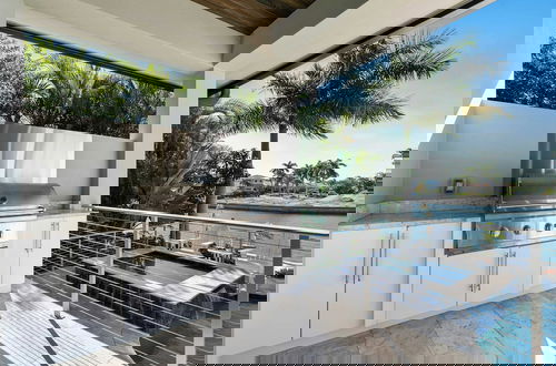 Photo 13 - Marco Polo by Avantstay Waterfront 5bdr, Pool, Spa, Fire Pit, Walk to Beach
