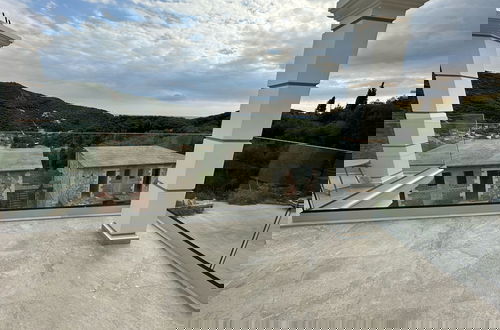 Foto 12 - Meliana Homes