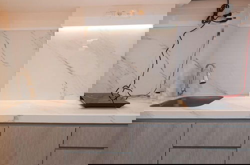 Photo 6 - Spacious Studio At Tamansari Skylounge Makassar Apartment
