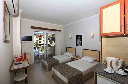 Foto 4 - Sun City Apartments & Hotel