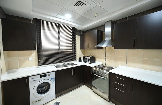 Al Waleed Holiday Homes - Foto 9