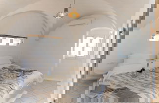 Photo 13 - Archetypo