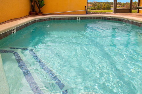 Photo 20 - Private Screened Splash Pool Overlooking Tranquil Lake Right Beside Disney World by Florida Dream Homes