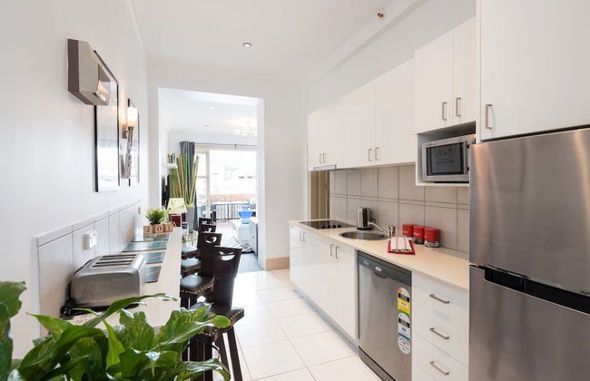 The Clock House Beachfront - Photo 7