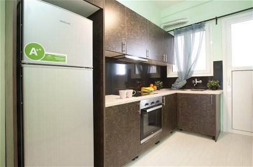 Foto 7 - Modern Comfortable Apartment
