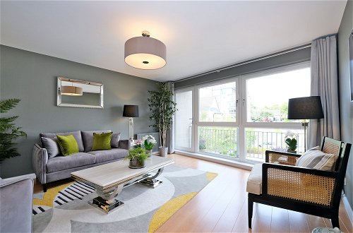 Photo 10 - Bright and Spacious Home With a Balcony and City Views