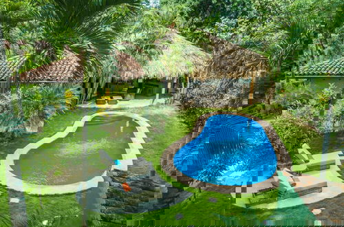 Photo 16 - Tropical Retreat - Private Pool, Steps To Beach 2 Bedroom Villa by RedAwning