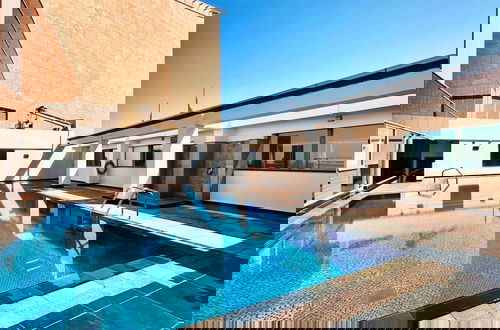 Photo 24 - Pristine Difc 2BR w Pool Gym