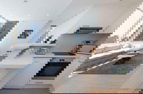 Photo 8 - Pristine Difc 2BR w Pool Gym