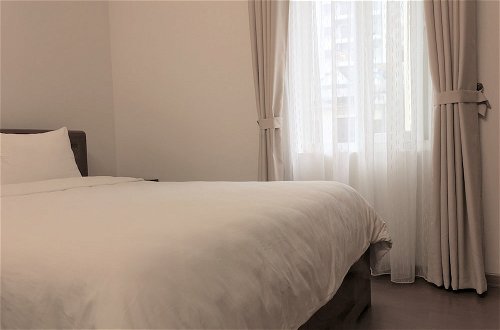 Foto 9 - Palmo Serviced Apartment 3