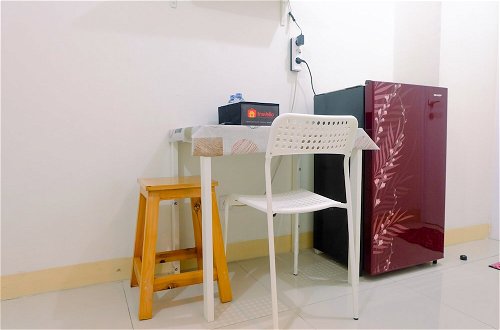 Photo 8 - Minimalist Studio with City View at Green Pramuka Apartment