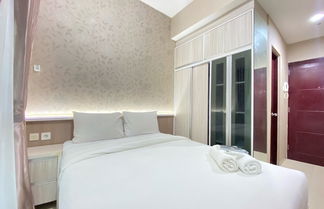 Photo 2 - Comfy Studio Room At Taman Melati Jatinangor Apartment