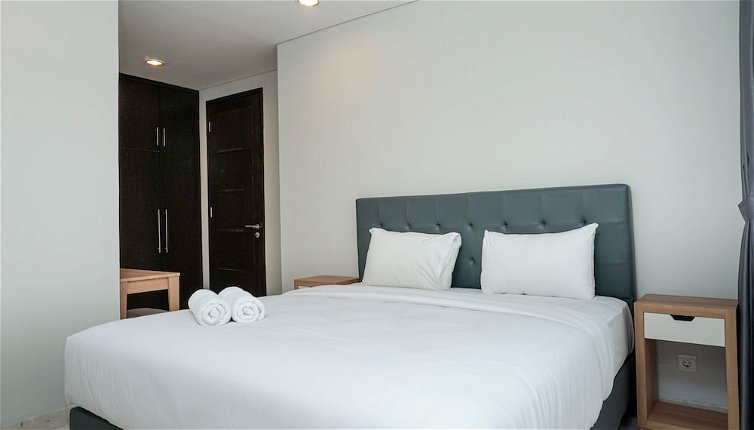 Photo 1 - Comfortable Deluxe 2BR at The Empyreal Condominium Epicentrum Apartment By Travelio