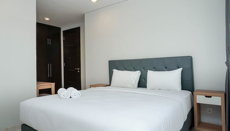 Photo 1 - Comfortable Deluxe 2BR at The Empyreal Condominium Epicentrum Apartment By Travelio