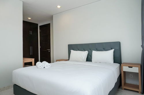 Photo 3 - Cozy 2BR at Empyreal Epicentrum Apartment By Travelio