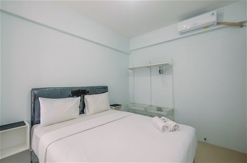 Photo 1 - Cozy Stay 2BR Tamansari Mahogany Apartment