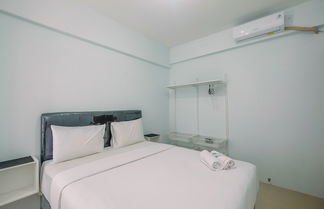 Photo 1 - Cozy Stay 2BR Tamansari Mahogany Apartment