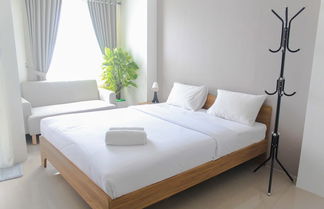 Foto 1 - Cozy Living Studio Room At Urbantown Serpong Apartment