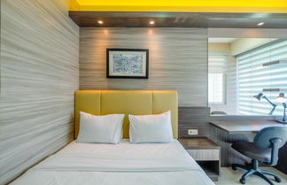 Photo 1 - Comfortable Studio Room At Grand Kamala Lagoon Apartment