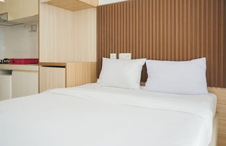 Foto 2 - Comfy And Minimalist Studio At Sky House Bsd Apartment