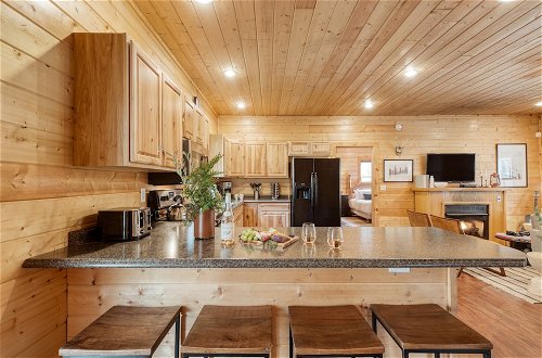 Photo 9 - Ashberry by Avantstay Large Cabin Surrounded in Pine Tree w/ River Views & Game Room