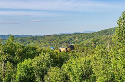 Photo 2 - Hollow's Haven by Avantstay Hot Tub, Sauna, Balcony and Tree Top Views