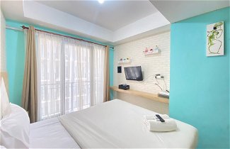 Photo 3 - Modern and Comfy Studio Room at Grand Asia Afrika Apartment