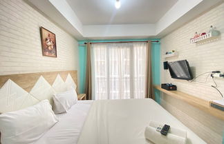 Photo 2 - Modern and Comfy Studio Room at Grand Asia Afrika Apartment