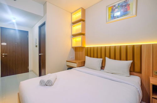 Photo 2 - Homey and Stylish Studio Room at Transpark Cibubur Apartment