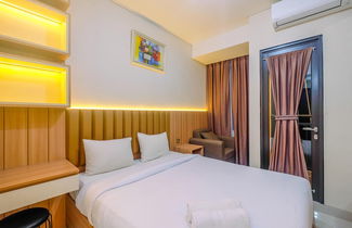 Photo 3 - Homey and Stylish Studio Room at Transpark Cibubur Apartment