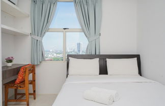 Photo 2 - Comfort 1Br Apartment At Silkwood Residences