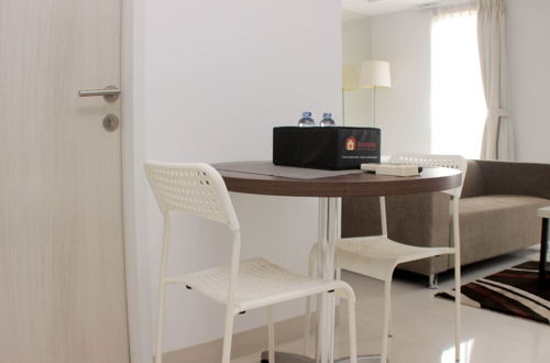 Photo 8 - Comfy And Spacious Studio Azalea Suites Apartment