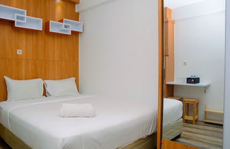 Photo 2 - Cozy Modern Studio at Lagoon Apartment near Bekasi Town Square