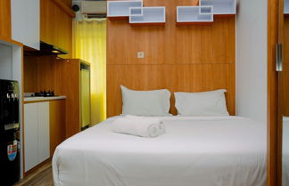 Photo 3 - Cozy Modern Studio at Lagoon Apartment near Bekasi Town Square