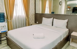 Photo 1 - Minimalist And Comfy Studio At Bintaro Icon Apartment