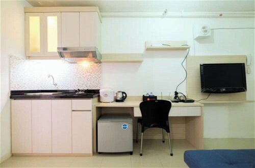Foto 6 - 1BR with Sofa Bed at Bassura City Apartment