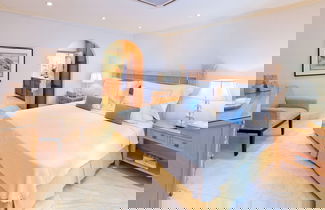 Foto 3 - Enchanting Beachfront Retreat - Leamington Cottage 1 Bedroom Villa by Blue Sky Luxury
