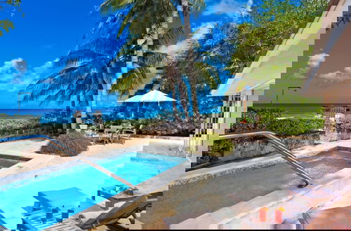 Foto 9 - Enchanting Beachfront Retreat - Leamington Cottage 1 Bedroom Villa by Blue Sky Luxury