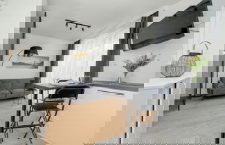 Photo 1 - Dark Grey Apartment in Poznan by Renters