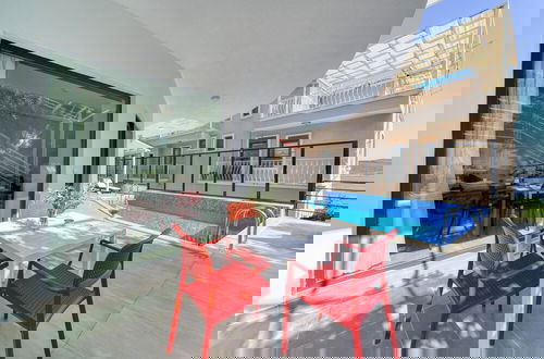 Foto 21 - BlueNook Suites
